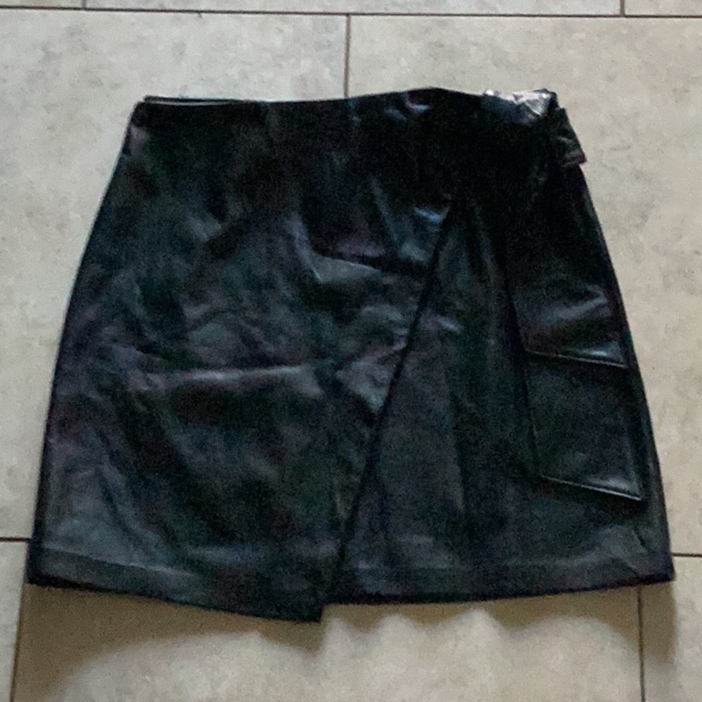 Nicole Miller Black Leatherette Skirt. Like new. Hardly worn.